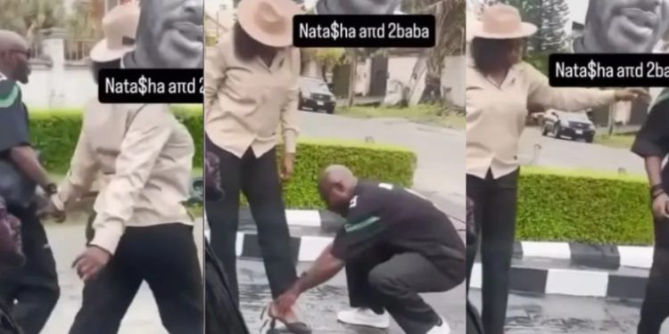Social media on fire, as Hon. Natasha seen commanding 2face to put on her shoe and hold her bag