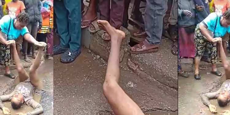 Colorado !!! Drama As Naked Lady Rolls In Muddy Water In Ogbomoso