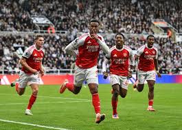 Arsenal produce late magic to steal win at Newcastle