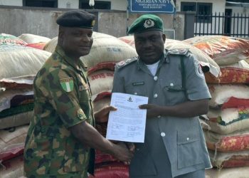 Navy hands over seized 585 bags of rice to Customs in Badagry