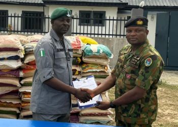 Navy hands over seized 372 bags of rice to customs in Badagry