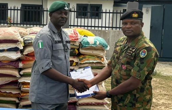 Navy hands over seized 372 bags of rice to customs in Badagry