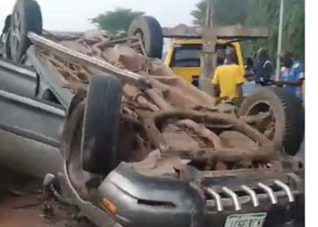 Mother and her son miraculously escape death as Lexus overturns multiple times in Igando, Lagos
