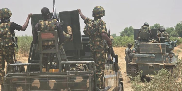Troops arrest 12 ISWAP logistics suppliers, informant in Borno