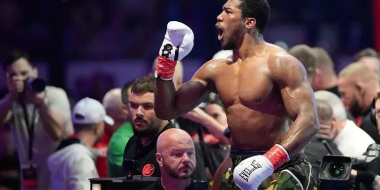 Joshua knocked down twice as dramatic win sets up Fury fight