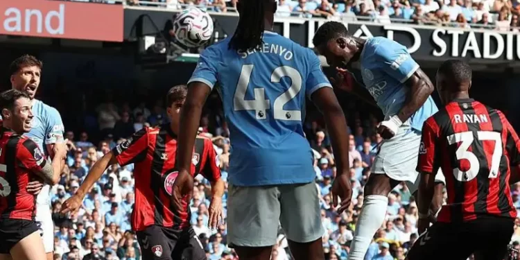 Man City scrape past Bournemouth with two late goals